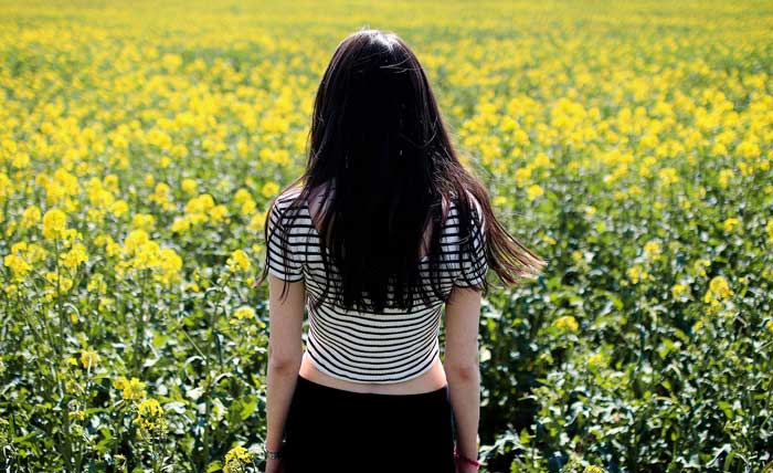girl in mustard field