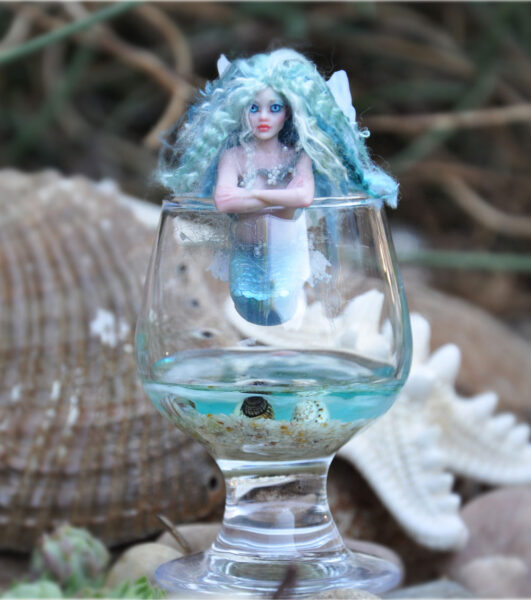 Series 4A FITA Mermaid Cup-Hugger Art Doll on the rim of a Mini Brandy Snifter